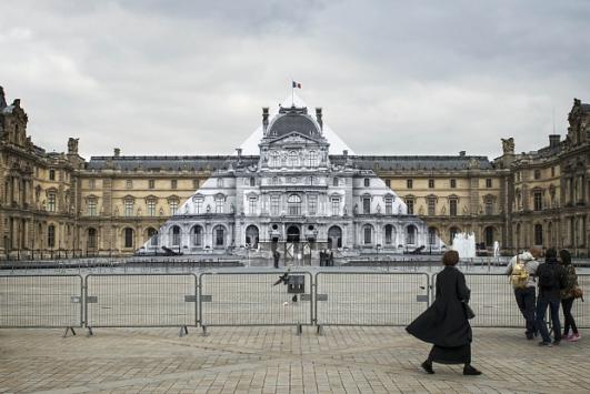 JR makes Louvre pyramid disappear