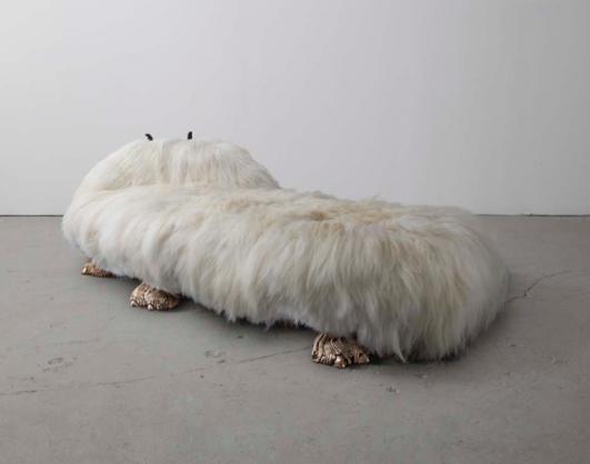 Unique Anna Nicole daybed from the Beast series, in white Icelandic sheep fur with zig-zag carved wooden horns and cast bronze camel toe feet. Designed and made by The Haas Brothers