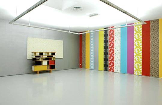 View of the Exhibition "3200 carrés" by Francois Morellet, 1957 and "Bibliothèque double face pour la Maison du Mexique" Chalotte Perriand 1953. Photo: Y. Bresson