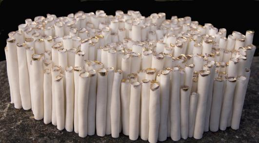 Leonora Richardson - Cylinders cells - Porcelain paper clay with gold lustre on tips - http://www.lrichardsonceramic.co.uk/ 