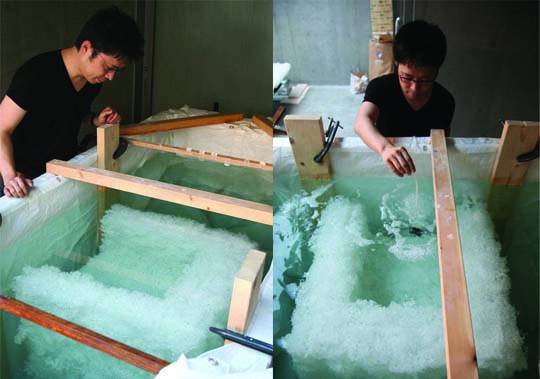 Tokujin Yoshioka demonstrating the process of creating a full scale chair.