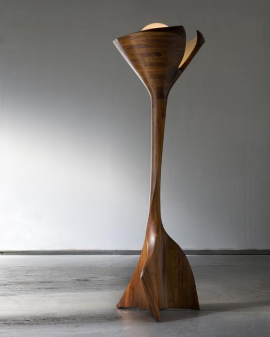 Unique floor lamp in hand-carved and stack-laminated walnut with glass globe. Designed and made by Wendell Castle, Rochester, New York, 1970. Signed and dated, "WC 70."